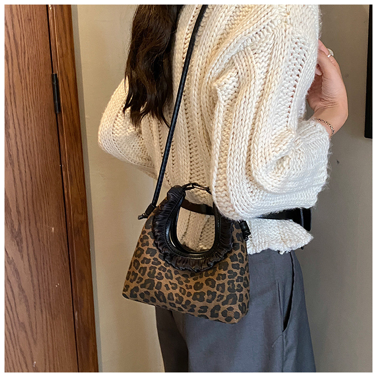 Moda coreana con patrón de leopardo para niñas bolsos de encaje exquisitos mini bolsos de hombro para bebés bolsos de comercio exterior transfronterizos para niños