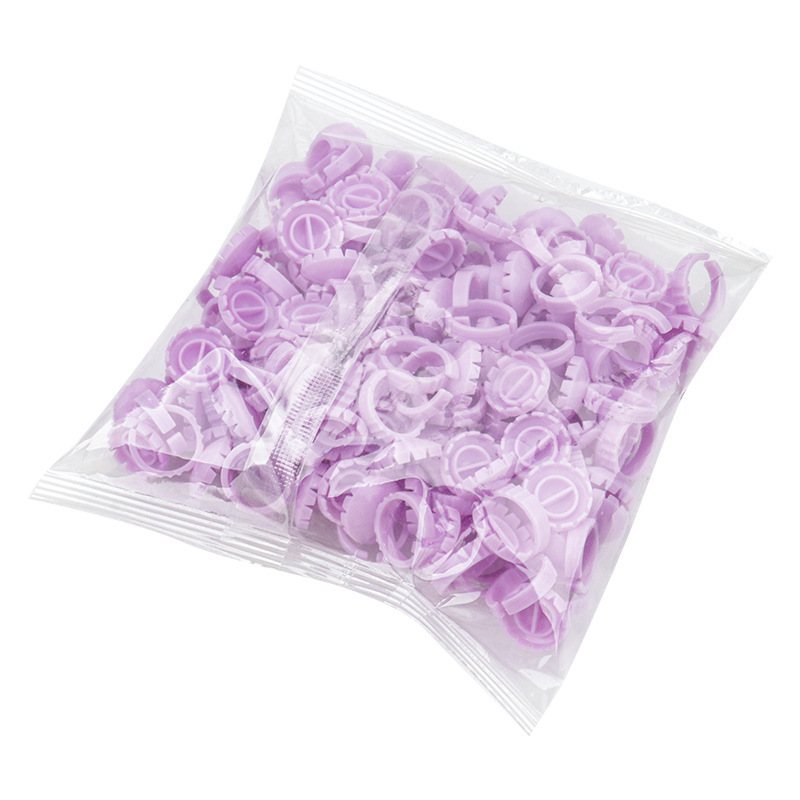 Venta al por mayor de pestañas postizas injertadas taza de anillo de goteo de pegamento 100/paquete de hermosas pestañas flor taza de anillo herramienta de bandeja de pegamento