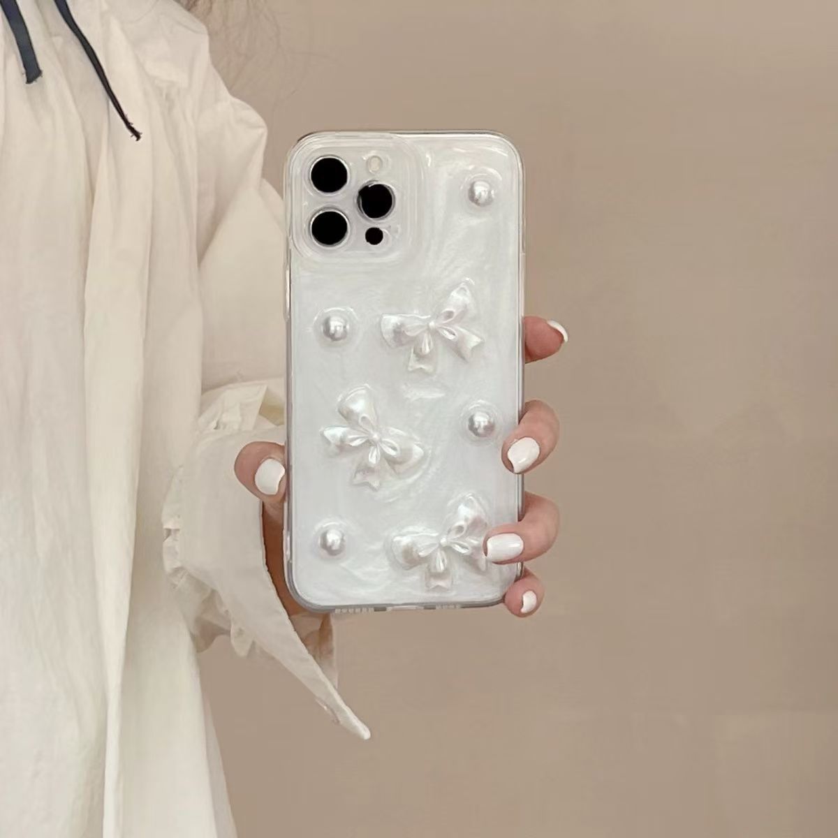 Arco de perla de crema de alta calidad para soporte de teléfonos móviles de Apple Huawei antideslizante image 1