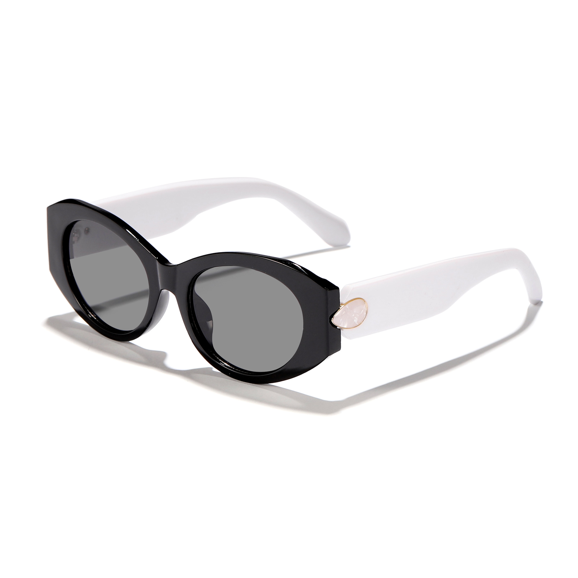 Gafas de sol de moda europeas y americanas, marco ovalado retro, accesorios de gemas, gafas de sol de pasarela de lujo ligero de alta gama para mujer