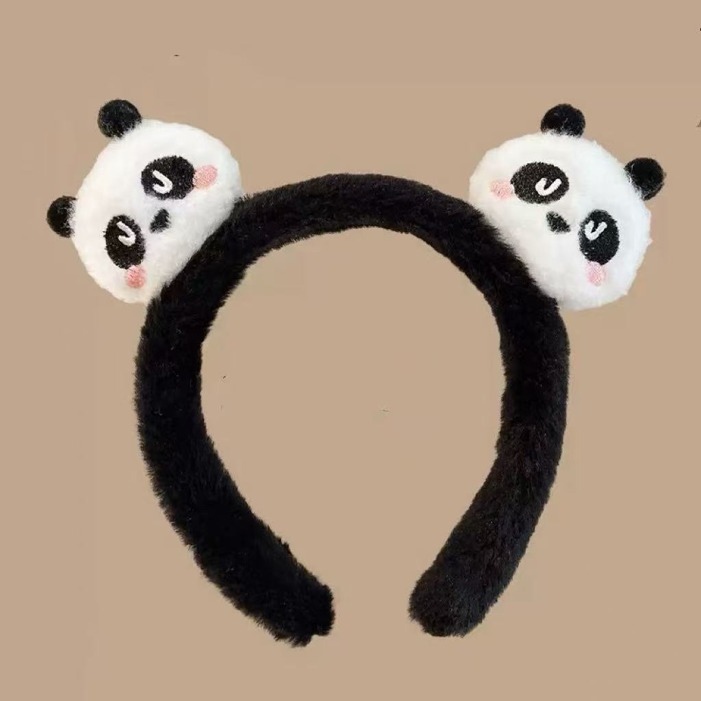 男女通用の大きいパンダのカチューシャは卸売りします。