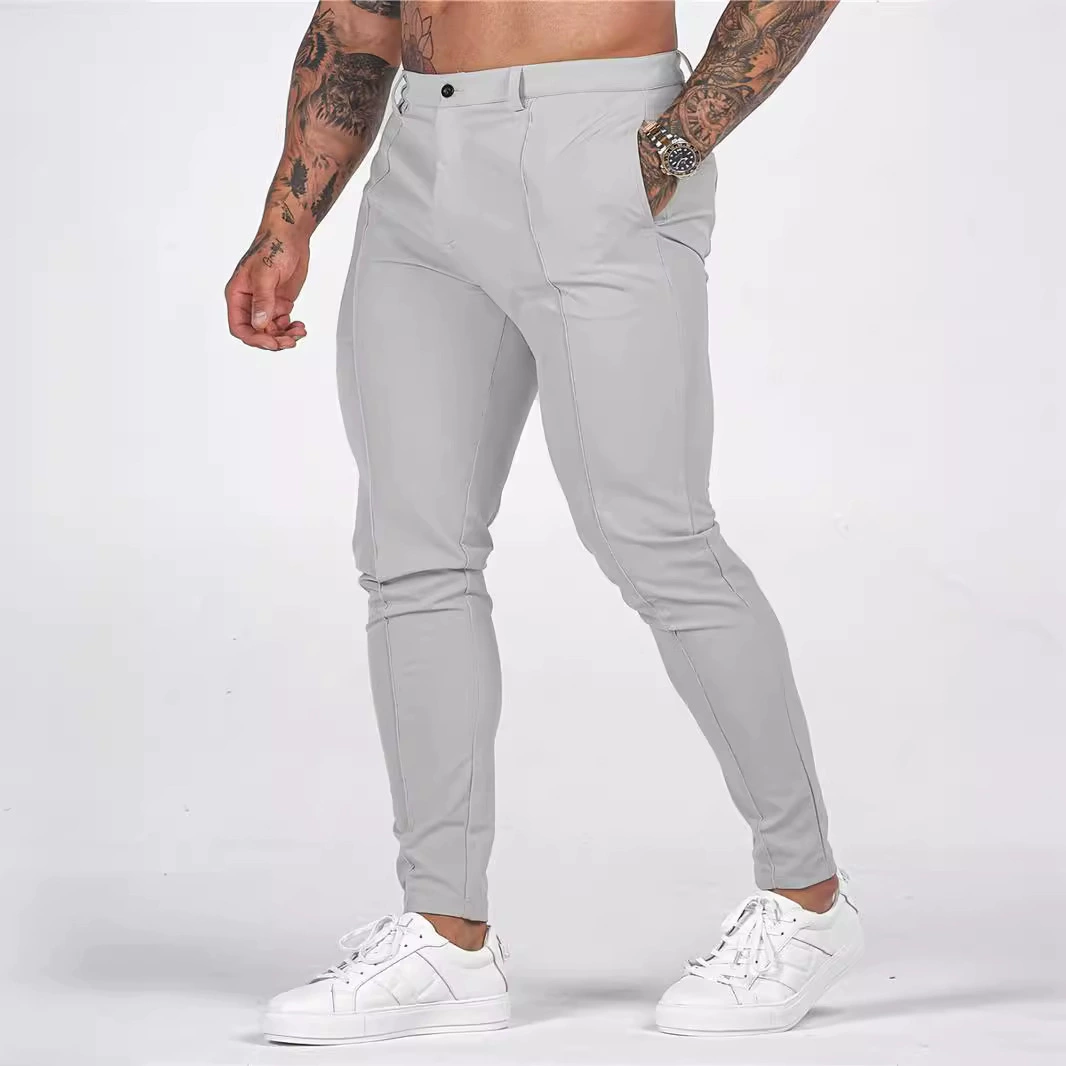 Европейские и американские трансграничные популярные мужские однотонные облегающие брюки с карманами на молнии, деловые повседневные узкие брюки с небольшими манжетами.