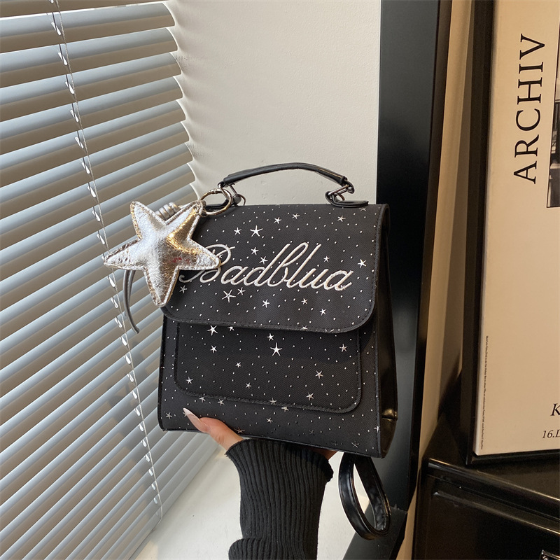 Mochila de moda coreana Full Sky Star 2026 nuevo estilo coreano estilo académico letras versátiles mochila de mano casual