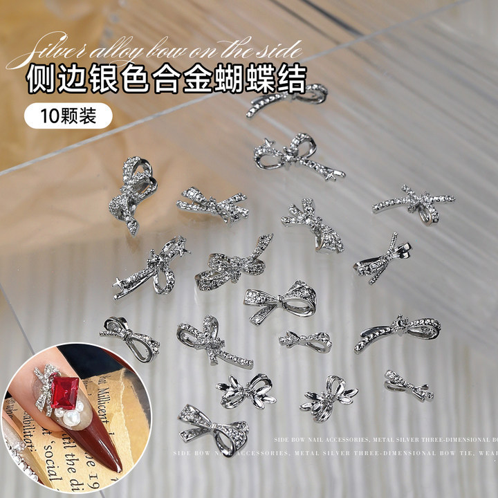 Alloy Bow Nail Art Jewelry silver Three-dimensional Side Hollow Ribbon Bow Tie Wear Armor Pile Diamond Accessories Material Alloy Bow Nail Art Jewelry silver Three-dimensional Side Hollow Ribbon Bow Tie Wear Armor Pile Diamond Accessories Material