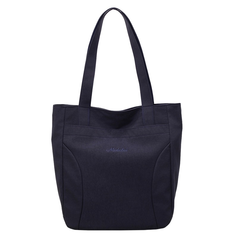 Bolsa de lona para mujeres nuevo estilo japonés retro simple de color sólido gran capacidad bolsa de transporte universal mochila universitaria