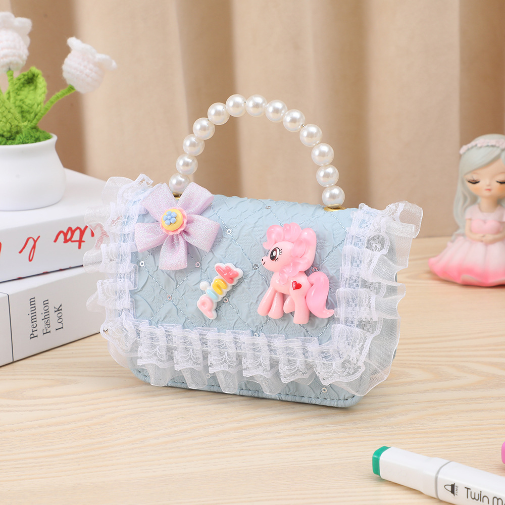 Cute divertido bolso para niños pequeño Xiangfeng perla monedero portátil pequeña princesa bolsa de almacenamiento bandolera estilo ins al por mayor