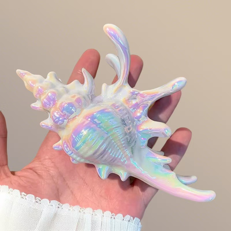 Mermaid conch gripper