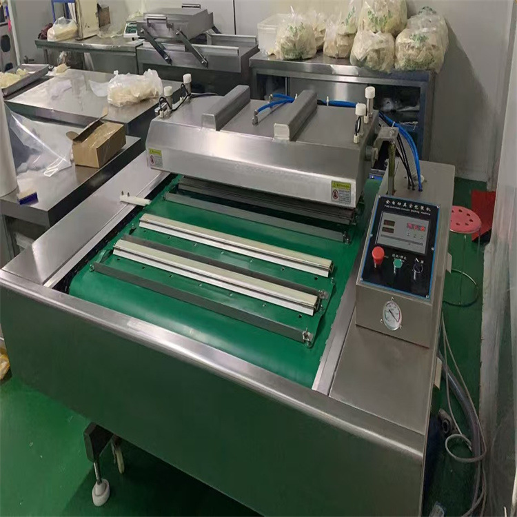 商用肉制品多功能连续滚动真空包装机1000型双室真空包装设备供应
