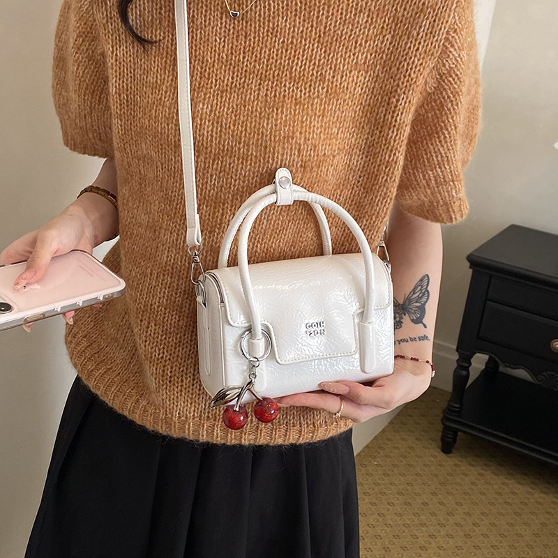 Super caliente bolso de trabajo para mujeres 2026 nueva primavera y verano moda universal bolso diario bolso de mochila