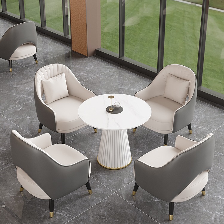 Sofá simple y lujoso, mesa de té, hotel de ocio, recepción de ventas, mesa y silla, salón de belleza para invitados.