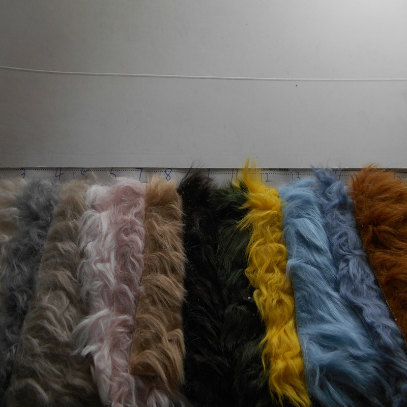 大兔毛蚯蚓纹毛绒布料人造毛皮革刷花滚束仿萝卜丝滩羊毛皮草面料