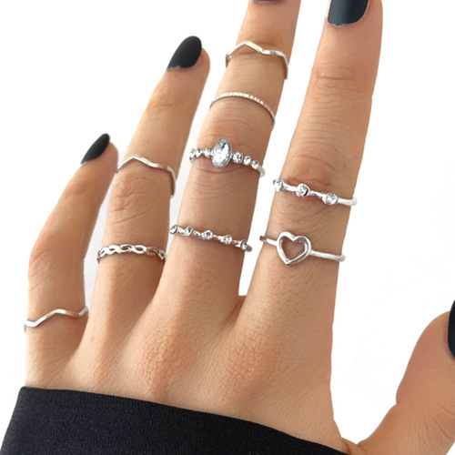 Cross-border best-selling simple new hollow love ring European and American style geometric wave-shaped 9-piece ring set