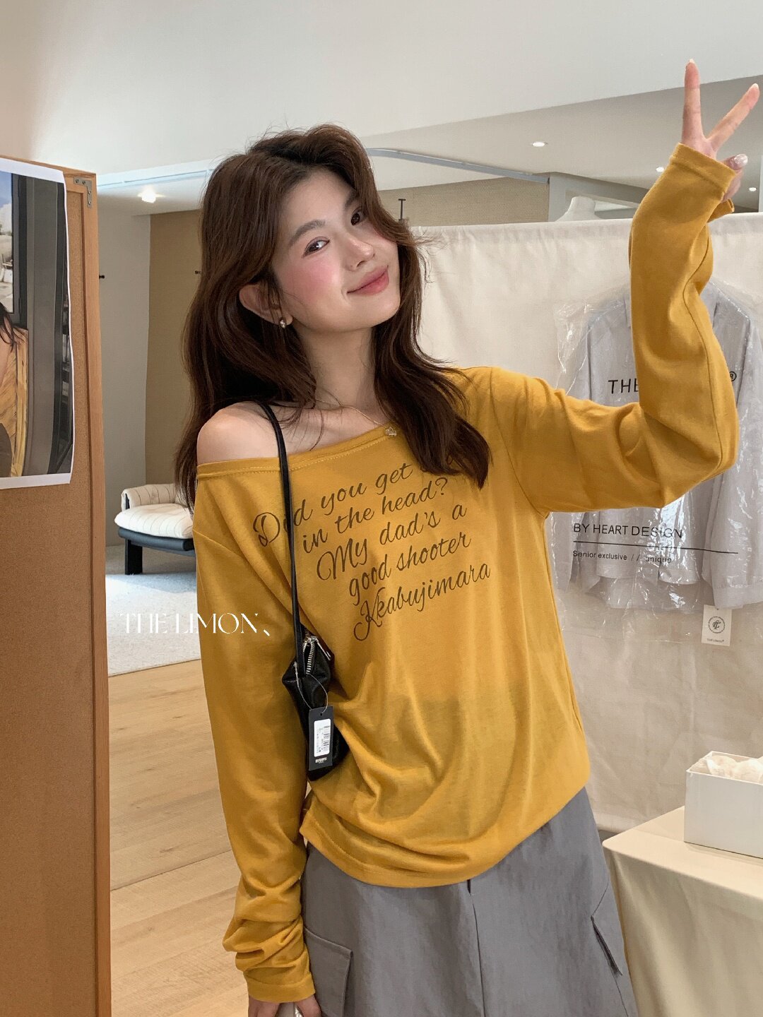 Áo thun nữ tay dài cổ tròn in chữ, phong cách Hàn Quốc, chất liệu cotton thoáng mát — màu đen, màu trắng, màu xám, màu vàng chi tiết 40