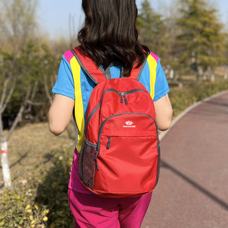 Mochila Mochila para estudiantes de viajes al aire libre Mochila plegable ligera Mochila de gran capacidad anti-salpicaduras Bolsos de moda para hombres y mujeres