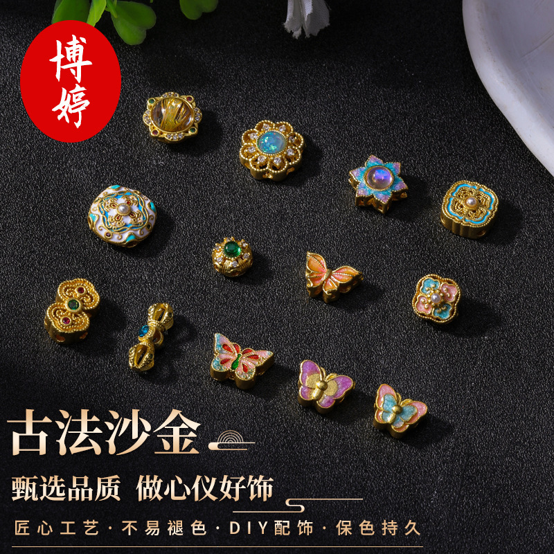 Strong color retention gold alloy diamond pestle butterfly bead manufacturers in stock wholesale alloy drop oil imitation gem accessories materials