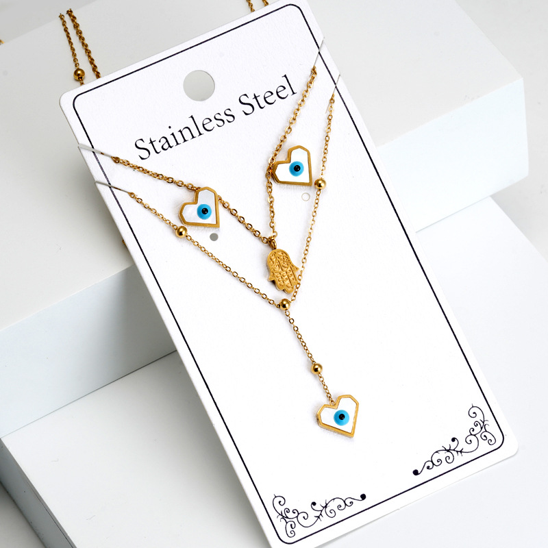 Retro Devilu0027S Eye Palm Heart Shape Titanium Steel Inlaid Shell Necklace