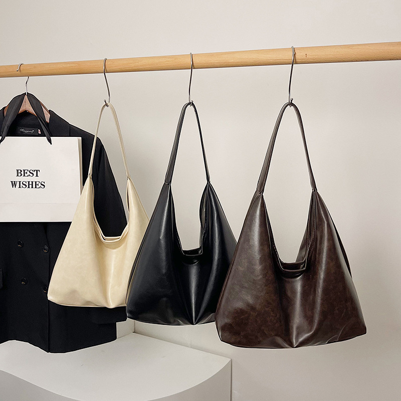 Gran capacidad de moda coreana textura hombro brazalete bolso para mujeres 2025 primavera nuevo estilo minimalista bolso de mujer