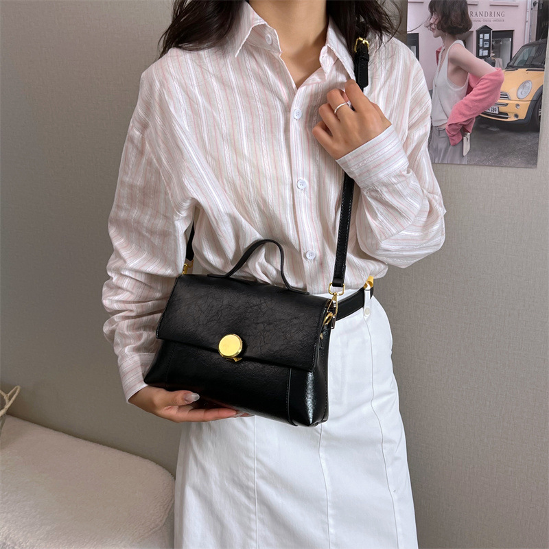 Bolso de moda casual personalizado bolso de tendencia simple diaria 2026 nuevo retro versátil mochila de hombro