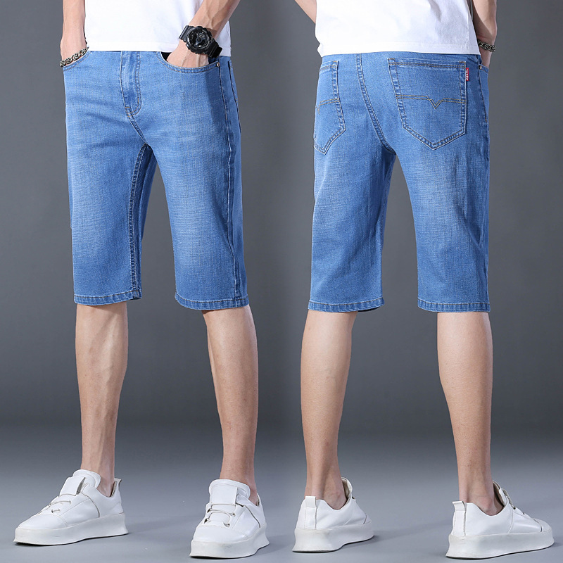 夏の薄いタイプの7分のズボンの男性のまっすぐな筒の紳士服のデニムのショートパンツの弾力性は夏の青年の中でズボンを修理します。|undefined