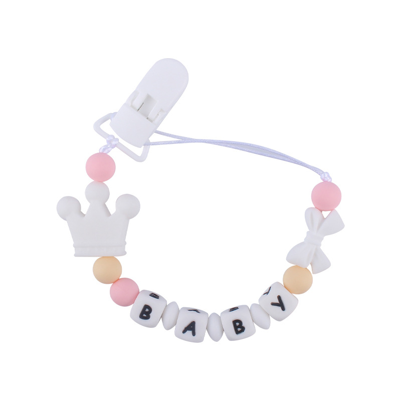 Suministros de bebé corona de dibujos animados cadena anti-gota bebé creativo DIY silicona mordedura pegamento molar chupete cadena