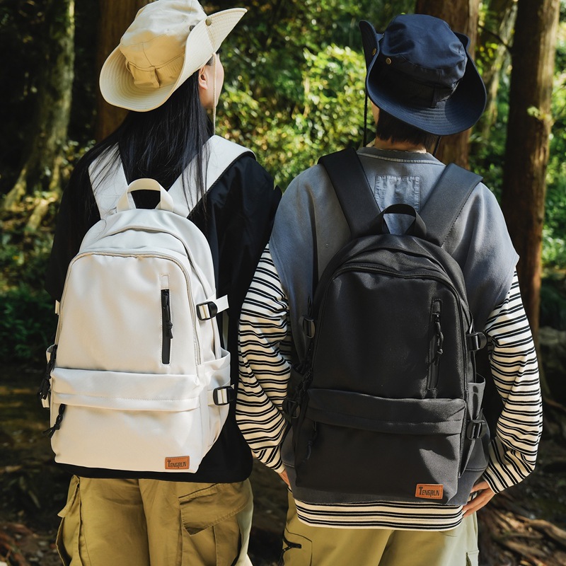 Mochila de nailon de gran capacidad de marca de moda 2024 mochila nueva simple universidad escuela secundaria escuela secundaria estudiante mochila escolar al por mayor