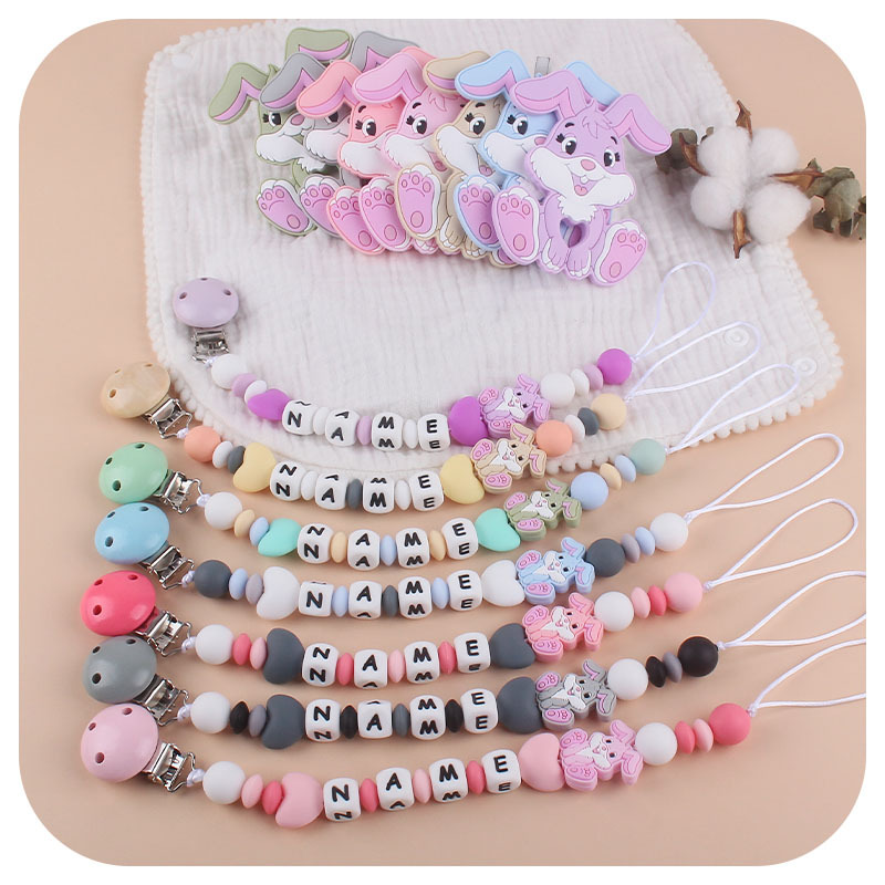 El Comercio exterior nueva cadena de chupete de conejo de silicona suministros para bebés personalizable nombre del bebé cadena anti-caída