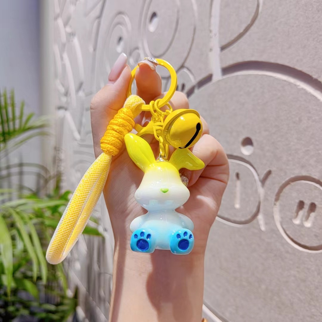 Gradiente oreja de conejo llavero de resina pequeño conejo colgante bolso de coche llavero colgante exquisito pequeño regalo