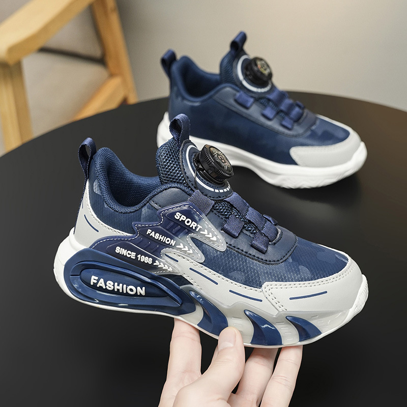 Zapatos de botón giratorio para niños primavera y otoño zapatos de malla transpirables para niños zapatos de corrida de moda universal al por mayor