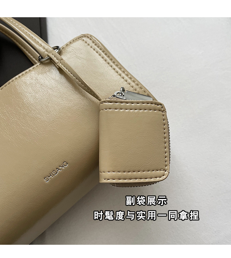 The 2024 new women's single-shoulder underarm bag is a simple and elegant commuting bag with a Korean-style niche design sense. It's a small square bag undefined