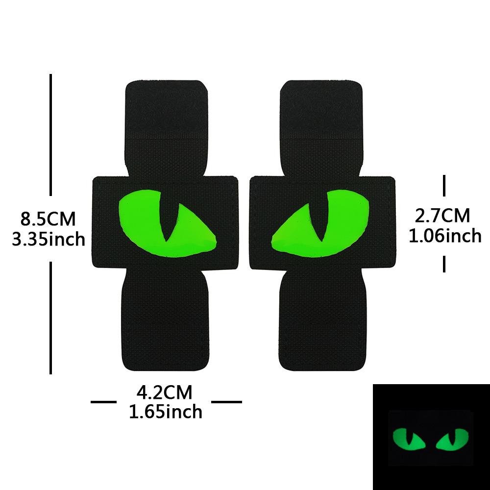 Creativo suministro personalizado gato ojo luminoso moral sello al aire libre militar fan mochila sello pequeño diablo militar MOLLE colgante