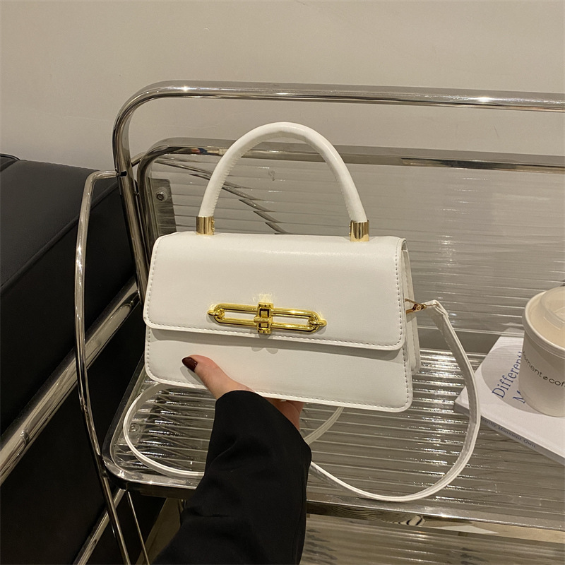 Nicho francés bolso bajo la axila para mujeres 2025 nuevo bolso cuadrado de textura personalidad bloqueo de moda mochila de hombro