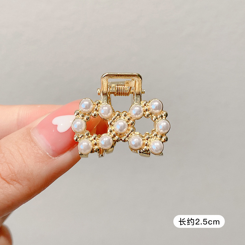 Pequeñas pinzas de cabello de perla temperamento feminino medio agarrado pinzas de cabello de borde pequeño adornamiento de cabeza de alto nivel no lastimar pinzas de cabello