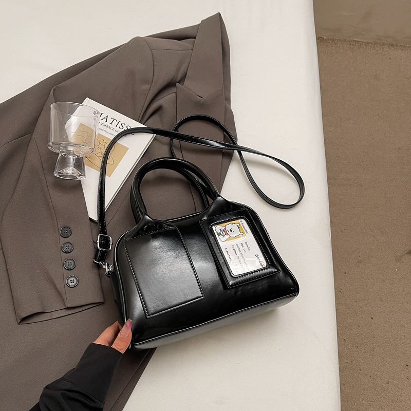 Bolso cuadrado pequeño portátil de niña linda en la mano 2025 nuevo bolso de mensajero de un solo hombro de moda coreana bolso femenino de alta gama