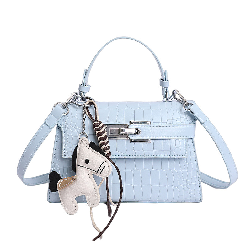 Bolsos de textura de nicho de cocodrilo de alta calidad, bolsos de mujer 2026 nuevos bolsos de mochila, bolsos de bloqueo de moda
