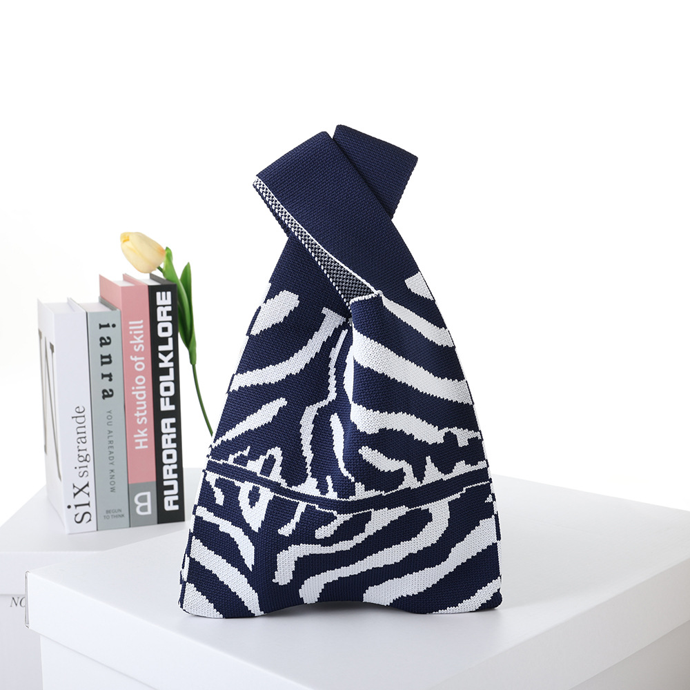 2024 Flying Weaving Bag Tote Bag Versión coreana del nuevo bolso de mano de moda Fabricante de bolsas de compras casuales de gran capacidad para estudiantes