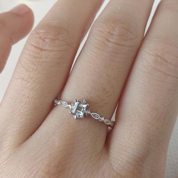 Yunjin transfronterizo nuevo pequeño anillo elegante fresco europeo y americano nicho diamante incrustado Topacio mar azul circón anillo