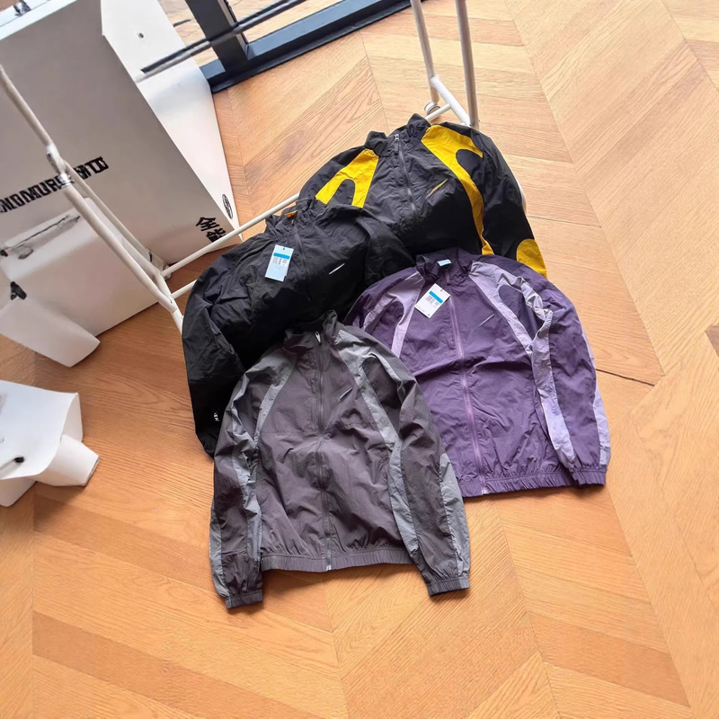 Nocta Spring and Summer Co-Branded Jacket Offset Hook Men and Women Couple Splicing Contrasting Color Light Stand Collar Jacket 25 Styles