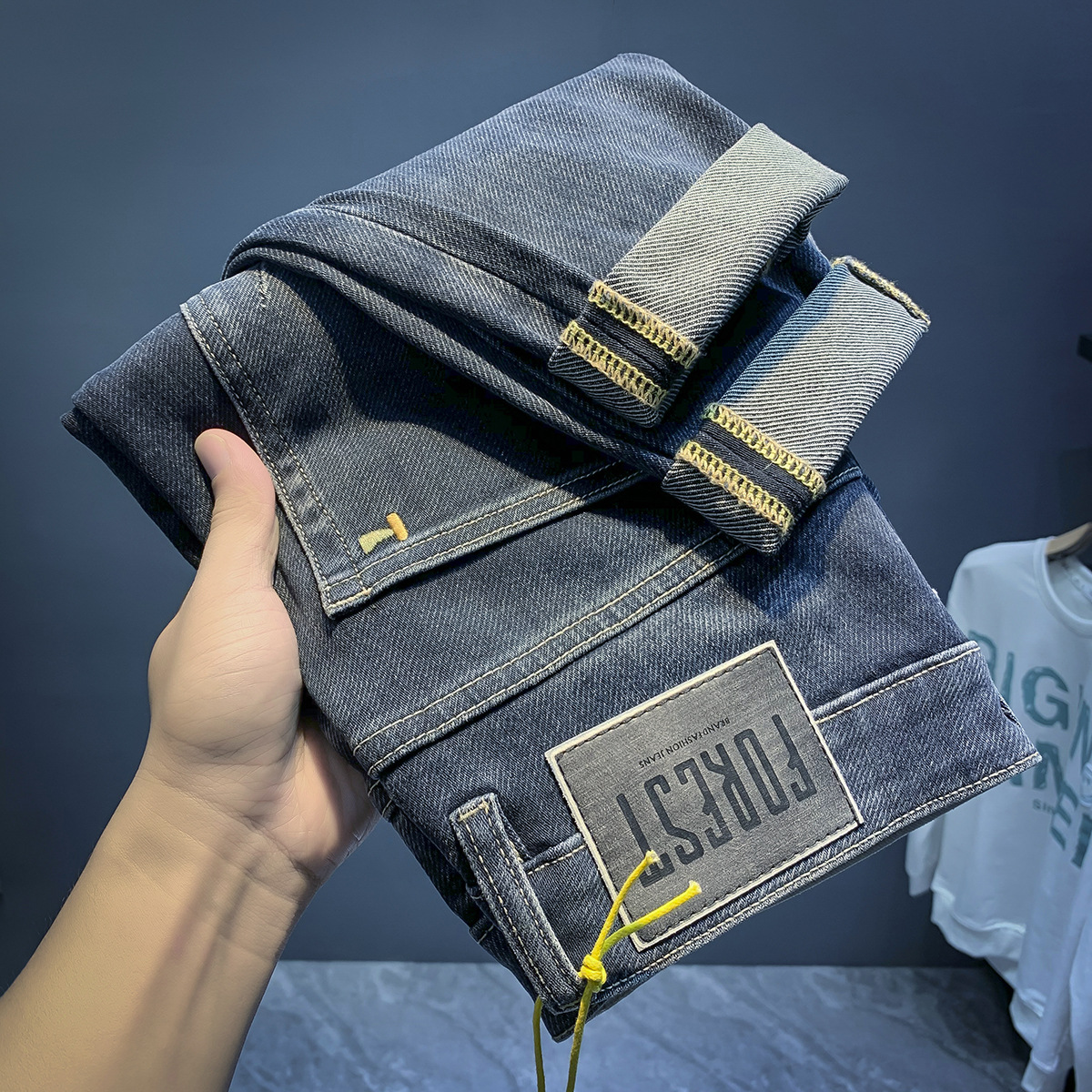 Jeans élastiques de marque de mode européenne pour les nouveaux styles de printemps et d'automne, pantalons polyvalents slim fit haut de gamme pour hommes_voghion.com