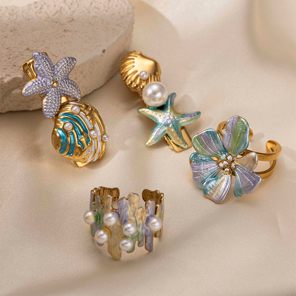 Tena anillo de acero inoxidable europeo y americano femenino no se desvanece mar playa viento horquilla anillo conjunto flores transfronterizas joyas
