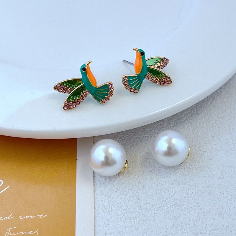 Elegant Cute Bird Imitation Pearl Copper Plating Zircon Women's Ear Studs 1 Pair display picture 3