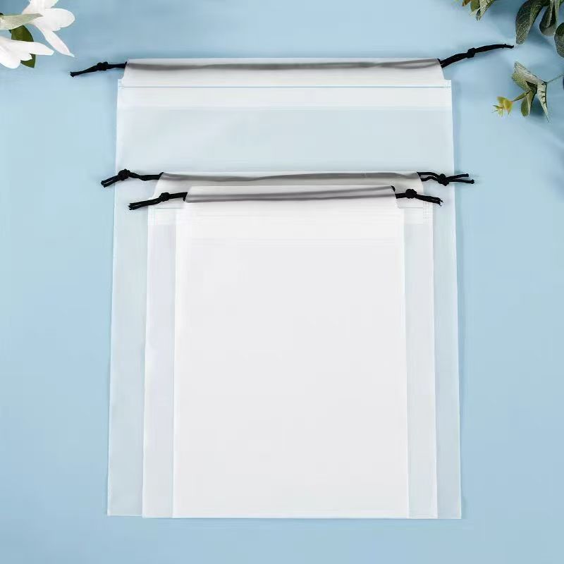 Pe bolso con cordón esmerilado al por mayor grueso ropa interior transparente calcetines zapatos ropa a prueba de polvo embalaje bolsa de almacenamiento de viaje