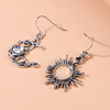 Retro asymmetrical earrings solar-powered, boho style, moonstone