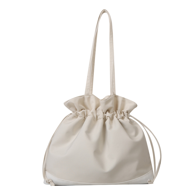 2023 nuevo estilo occidental casual color sólido Portátil Bolsa grande para las mujeres Solo bolso de hombro de invierno de moda cordón bolsa de almacenamiento de gran capacidad