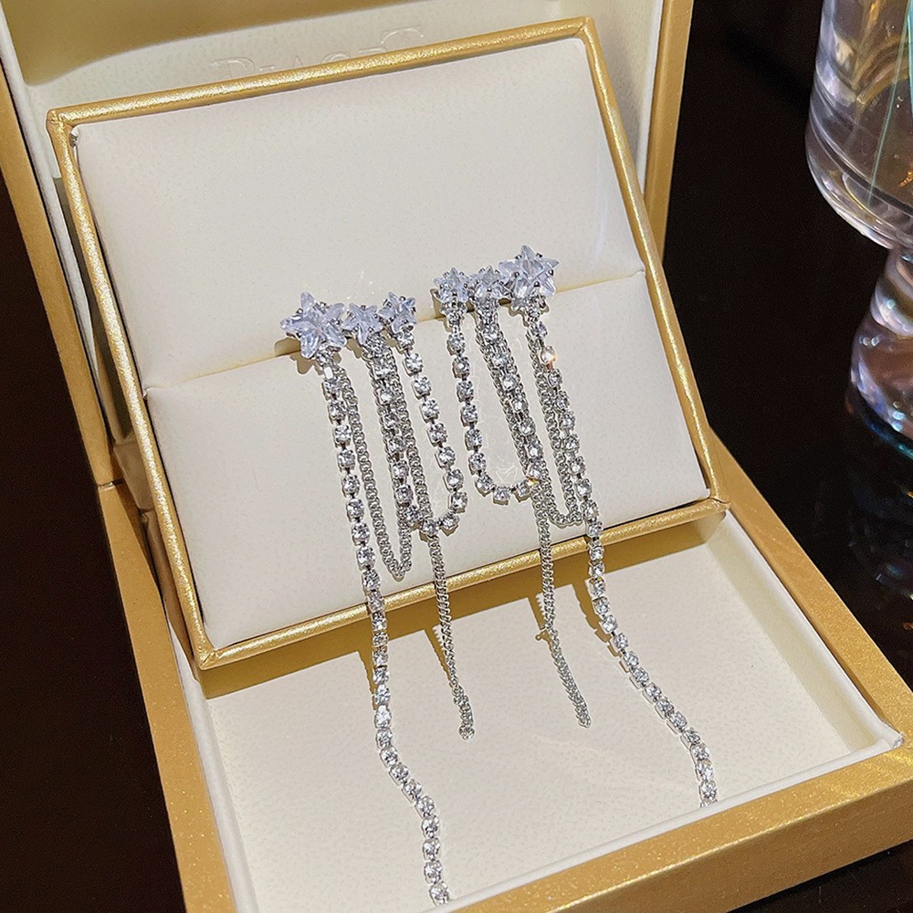 S925 aguja de plata elegante borla pendientes de alta gama simple cara de adelgazamiento pendientes de todo fósforo estilo coreano nuevos pendientes de moda al por mayor