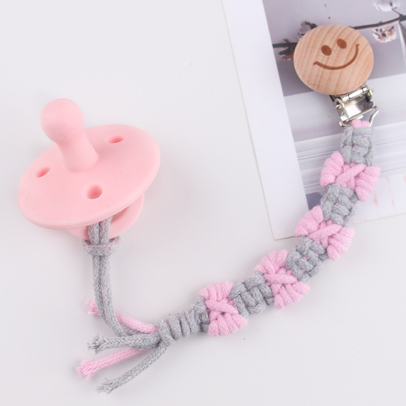 Productos para bebés de beech sonriente clip de tetina creativo puro tejido a mano cuerda de tetina de textura de arco anti-caída cadena