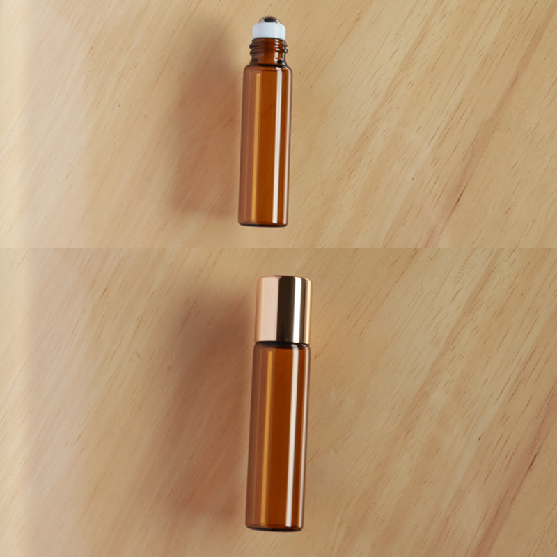 Botella roll-on para aceites esenciales cosméticos, botella marrón para aceites esenciales, botella transparente para reactivos, botella roll-on de vidrio, botella de perfume ámbar.