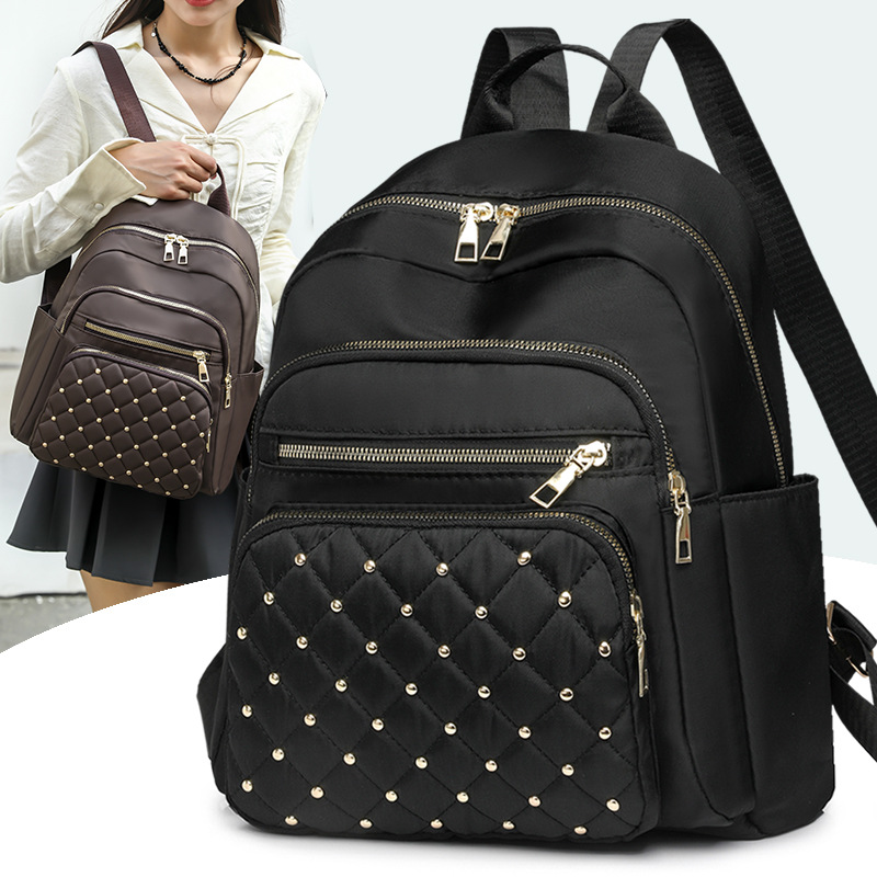 2024 verano nuevo estilo señoras nylon rombo mochila de viaje de viaje de ocio ligero al por mayor