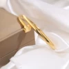 【137】Golden four-leaf flower nail bracelet