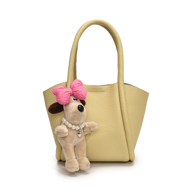 Bolso de cubo de mano de estilo explosivo transfronterizo para mujer 2025 nuevo bolso de hombro de alta gama de nicho bolso de cesta de verduras de moda coreana