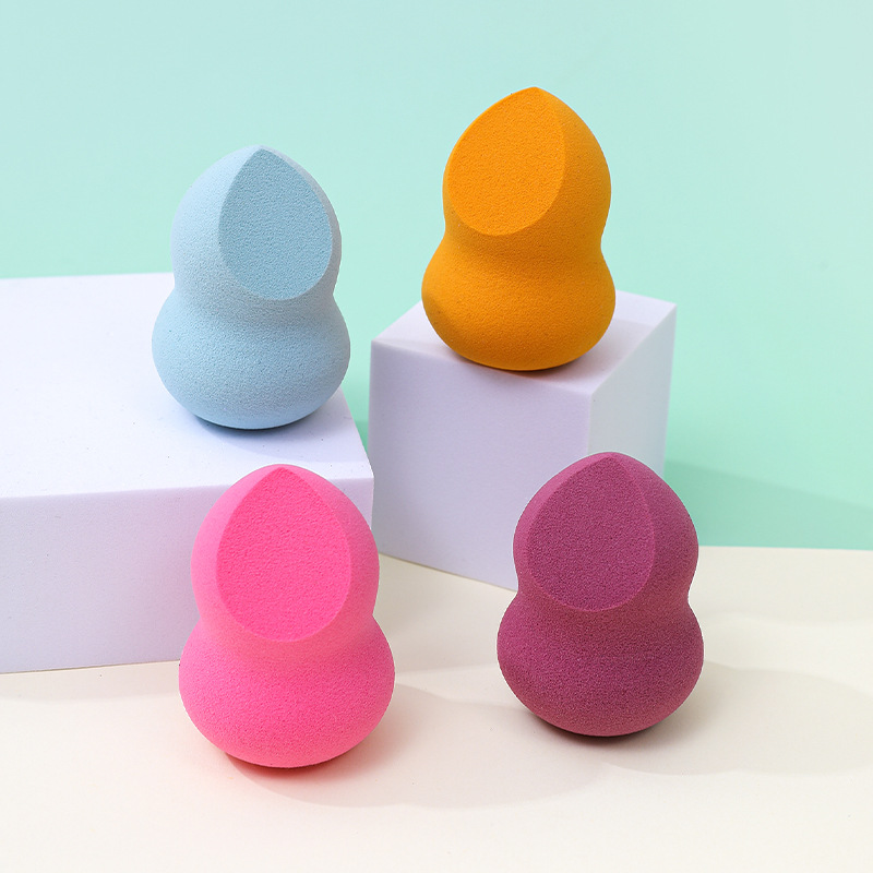 Fábrica personalizada cortar un cuchillo de polvo de maquillaje de huevo no comer polvo en forma de calabaza de poliuretano esponja de maquillaje de huevo de maquillaje